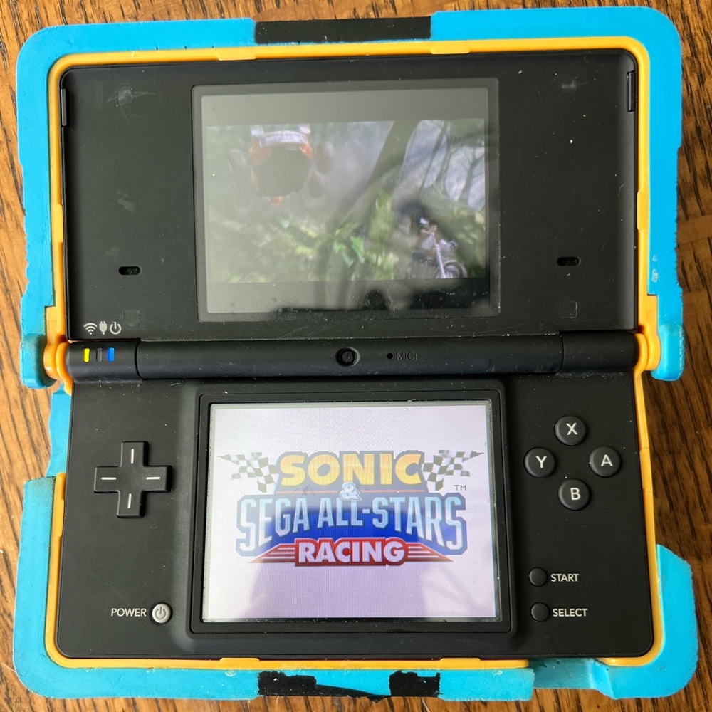 Nintendo DS Game Console with protective case and 9 games